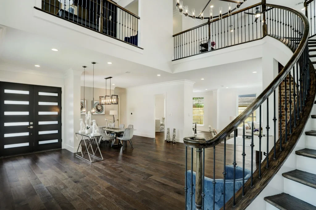 Ella Residence — Entry hall and curved staircase