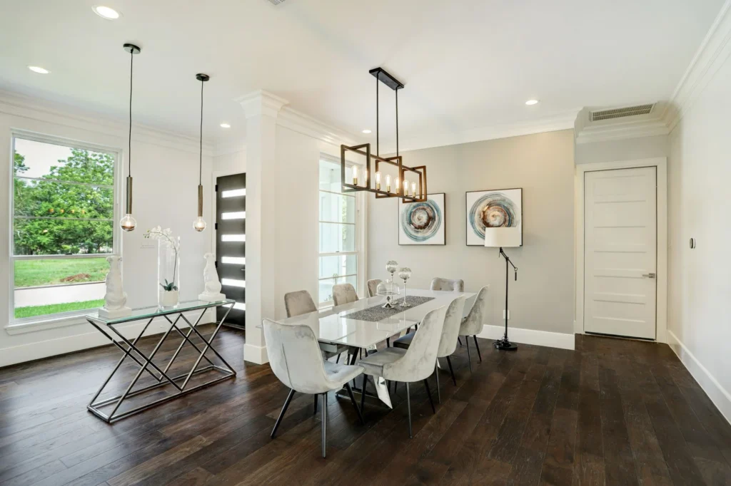 Ella Residence — Dining room with linear pendant