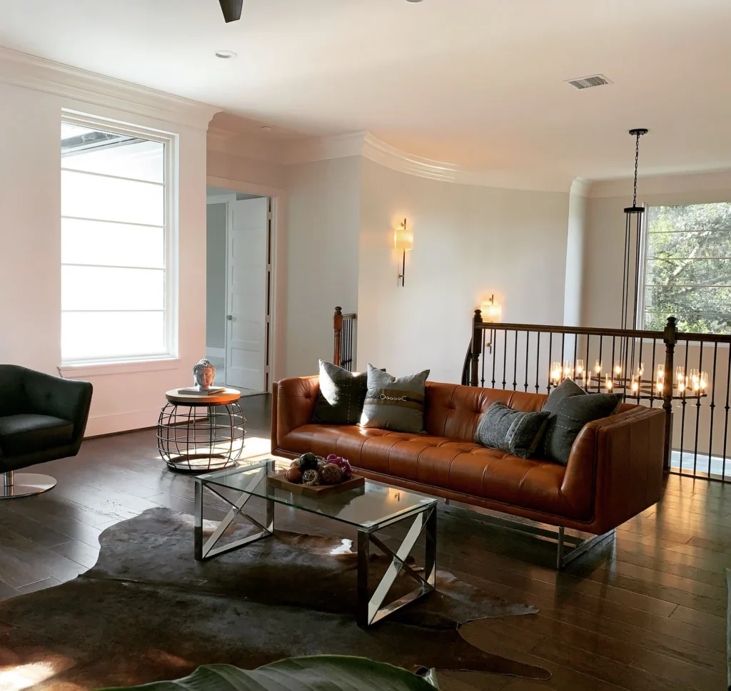 Ella Residence — Living room with leather seating