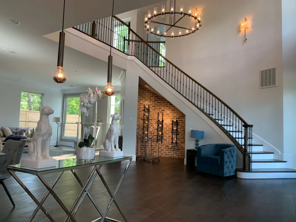 Ella Residence — Stair hall and brick feature wall